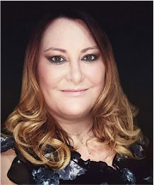 Headshot of Angela Thompson, registered nurse at AuDHD Psychiatry, smiling.